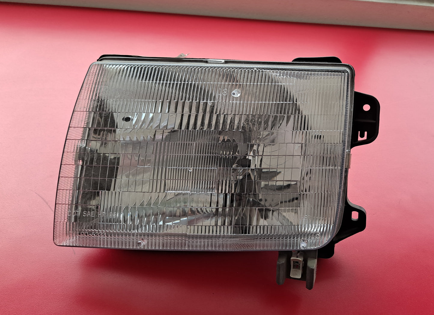 HEAD LAMP LH NISSAN FRONTIER (IZQUERDO) 1998-2000