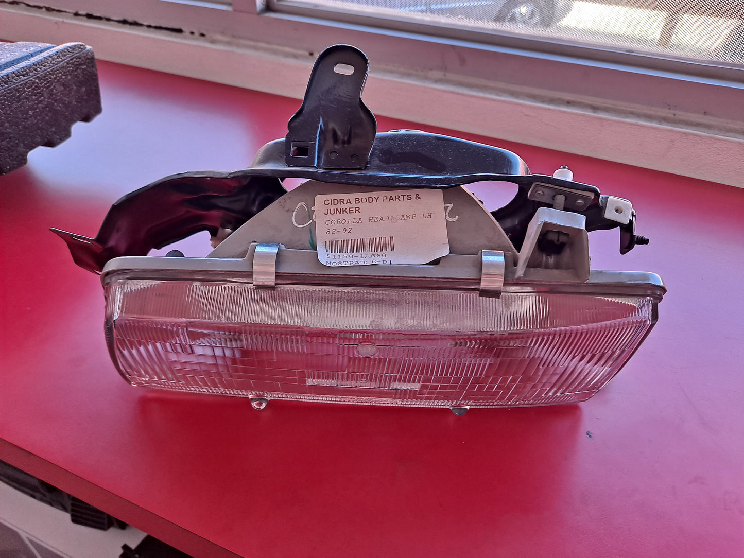 HEAD LAMP LH COROLLA 1988-1995 (LADO IZQUIERDO)