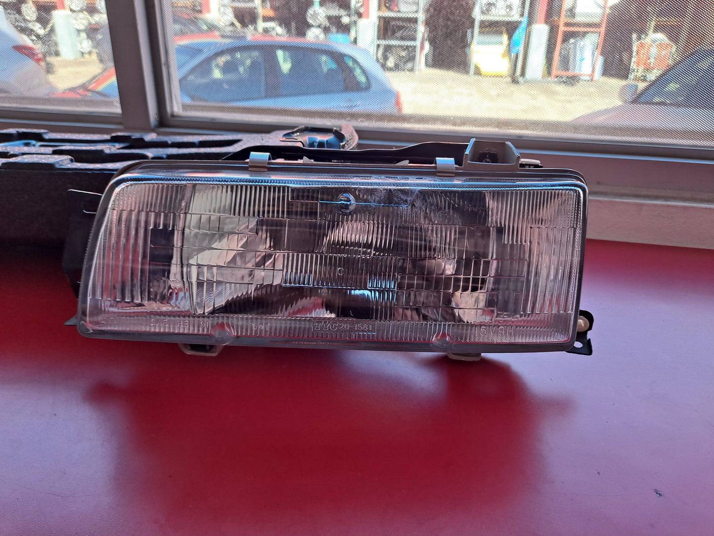 HEAD LAMP LH COROLLA 1988-1995 (LADO IZQUIERDO)