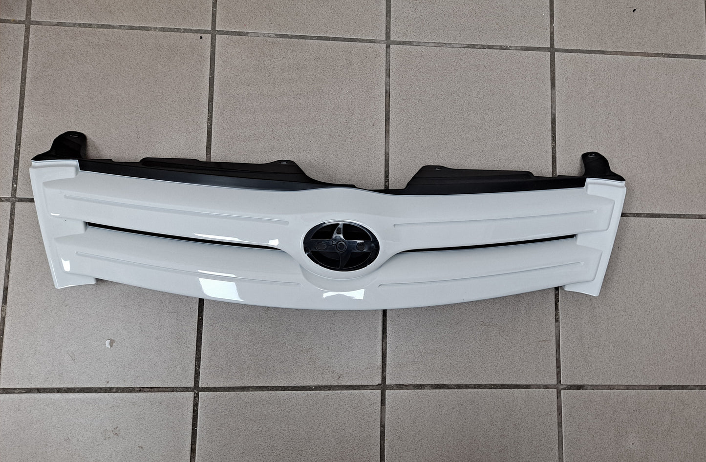 PARRILLA SCION XA 2004-2006 (NUEVO-ORIGINAL)