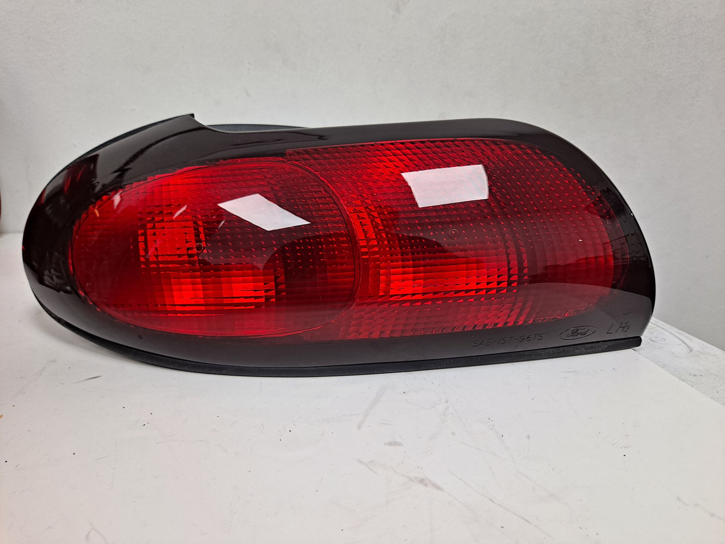 STOP LAMP LH TAURUS 1998-1999